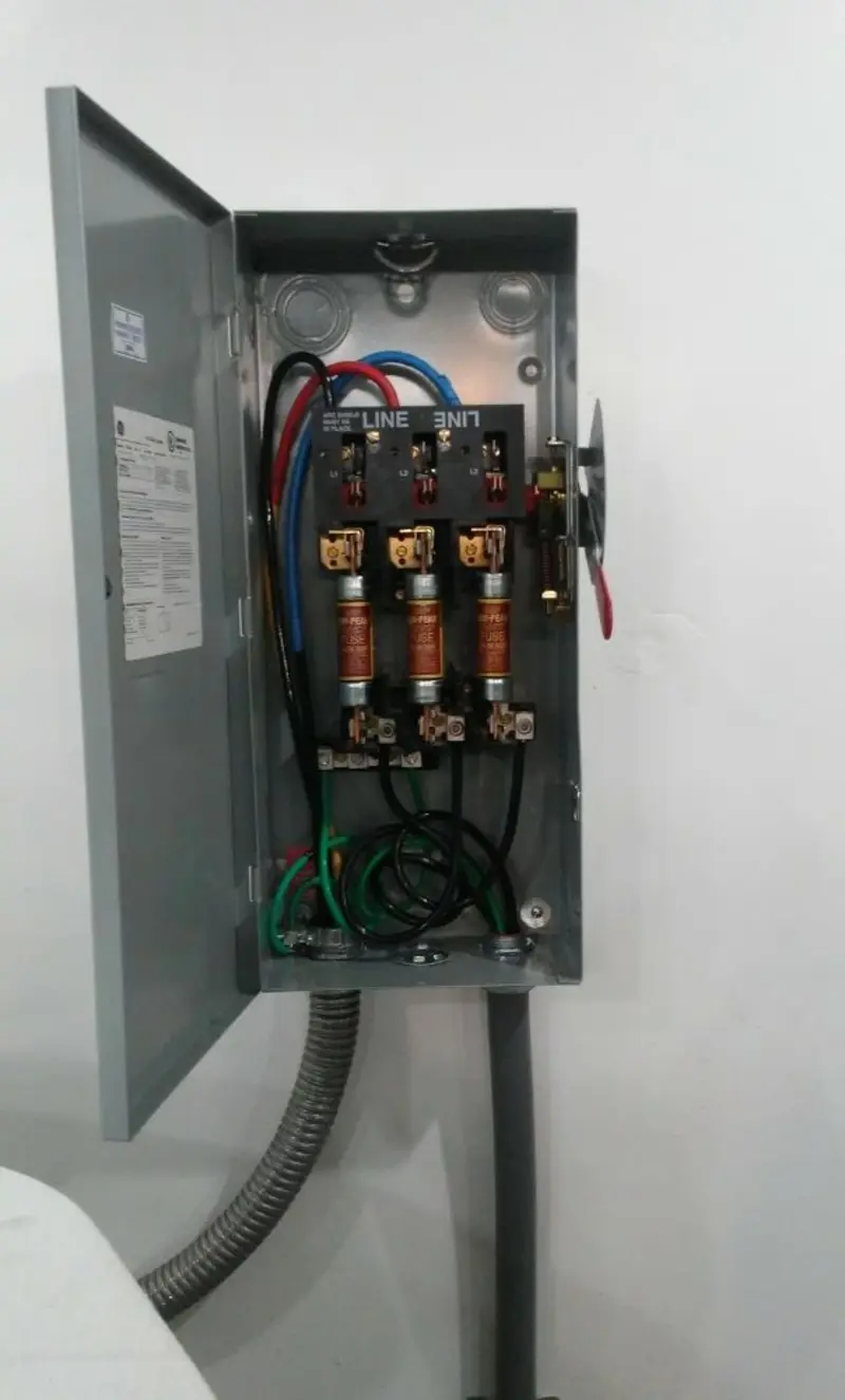 Three-phase disconnect switch installed for Smoke Detector Installation in Norwalk
